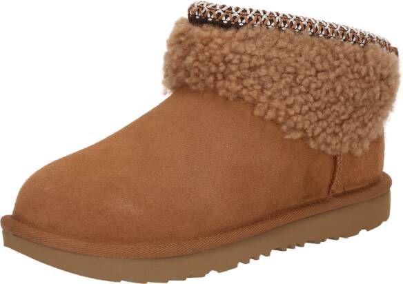 Ugg Classic Ultra Mini enkellaarsje van suède met details van schapenvacht