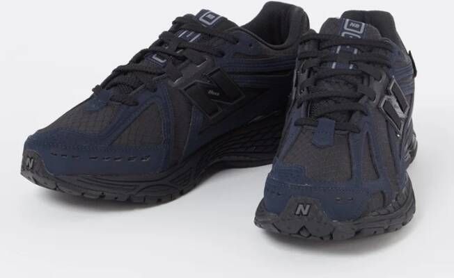 New Balance 1906 sneaker met leren details