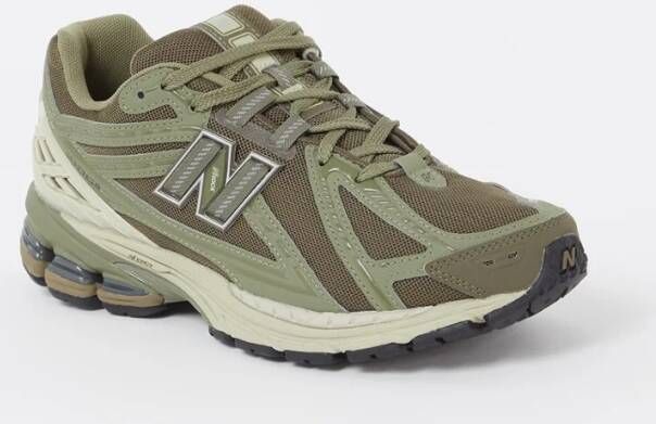 New Balance 1906 sneaker met details van leer