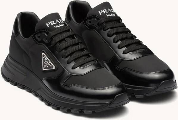 Prada Re-Nylon sneakers met leren details en logo