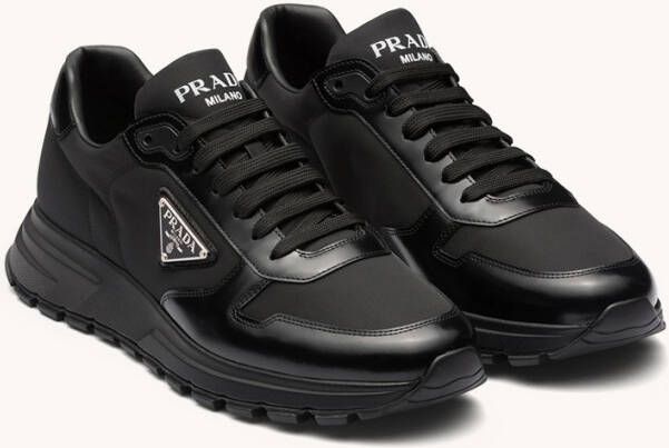 Prada Re-Nylon sneakers met leren details en logo