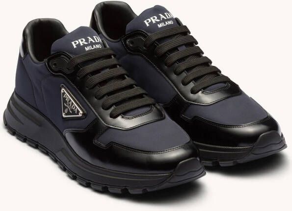 Prada Re-Nylon sneakers met leren details en logo