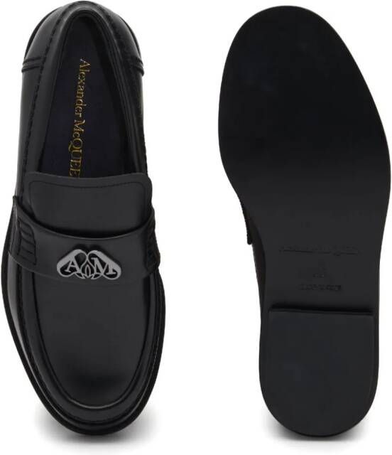 Alexander McQueen Leren loafers met Seal-plakkaat Zwart