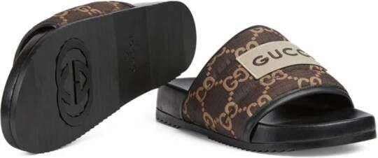 Gucci GG Supreme gevoerde slippers Bruin