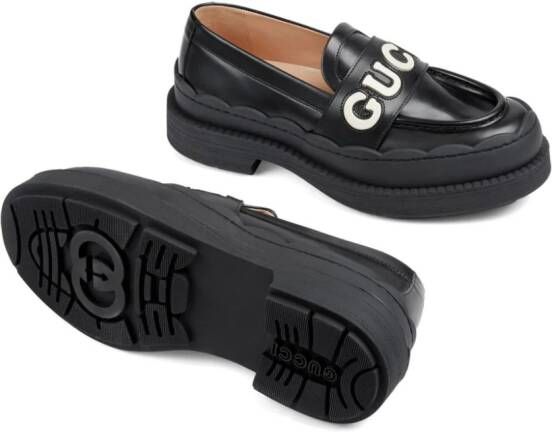 Gucci Loafers met logo-reliëf Zwart