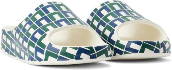 Lacoste Slippers met geometrische print en open neus Wit