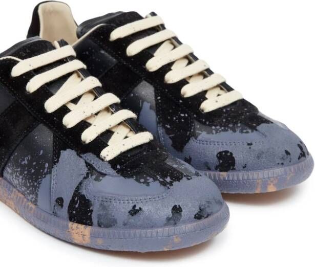 Maison Margiela Replica Paint leren sneakers Zwart