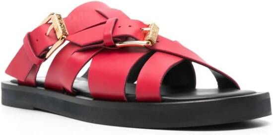 Moschino Leren slippers met gesp Rood