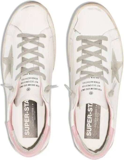 Golden Goose Low-Top Sneakers Superstar Distressed Lace-Up Sneakers in beige