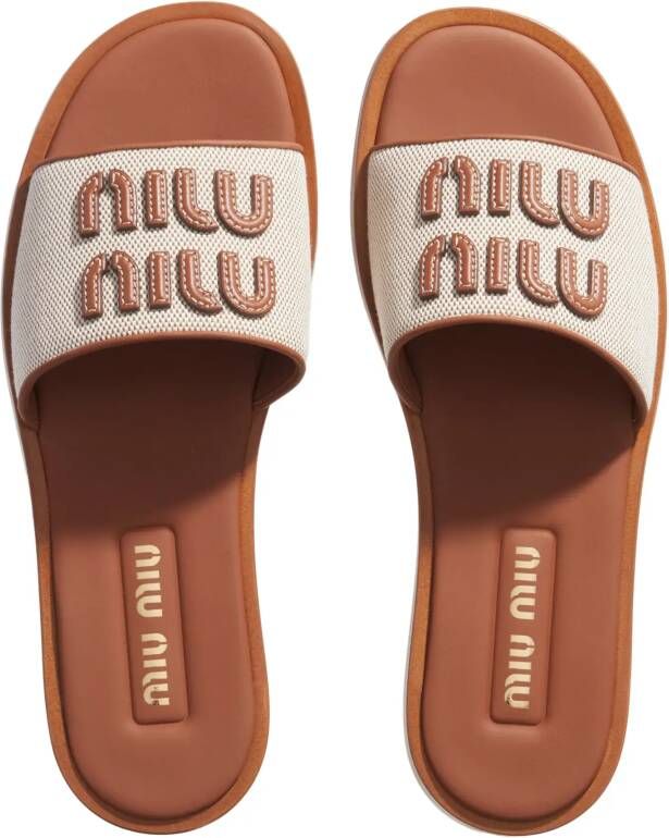 Miu Slippers & Mules Logo Slides in beige