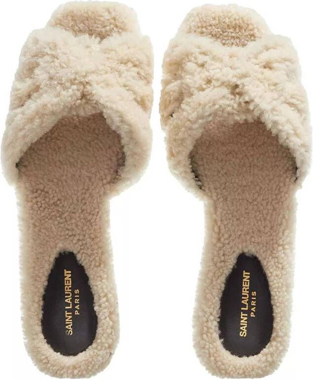 Saint Laurent Slippers & Mules Tribute Flat Mules Shearling in beige