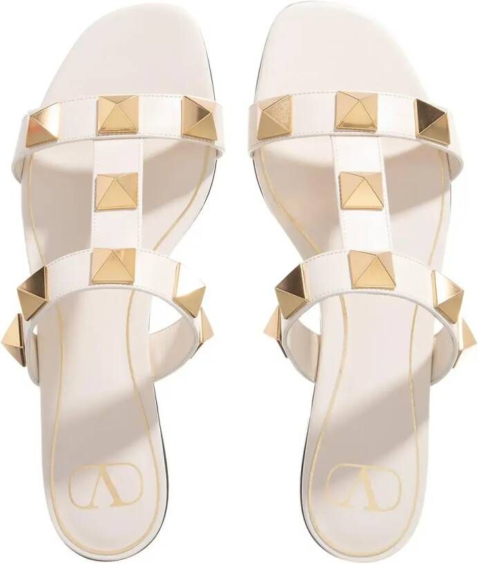 Valentino Garavani Slippers & Mules Roman Stud Slide Sandals in crème