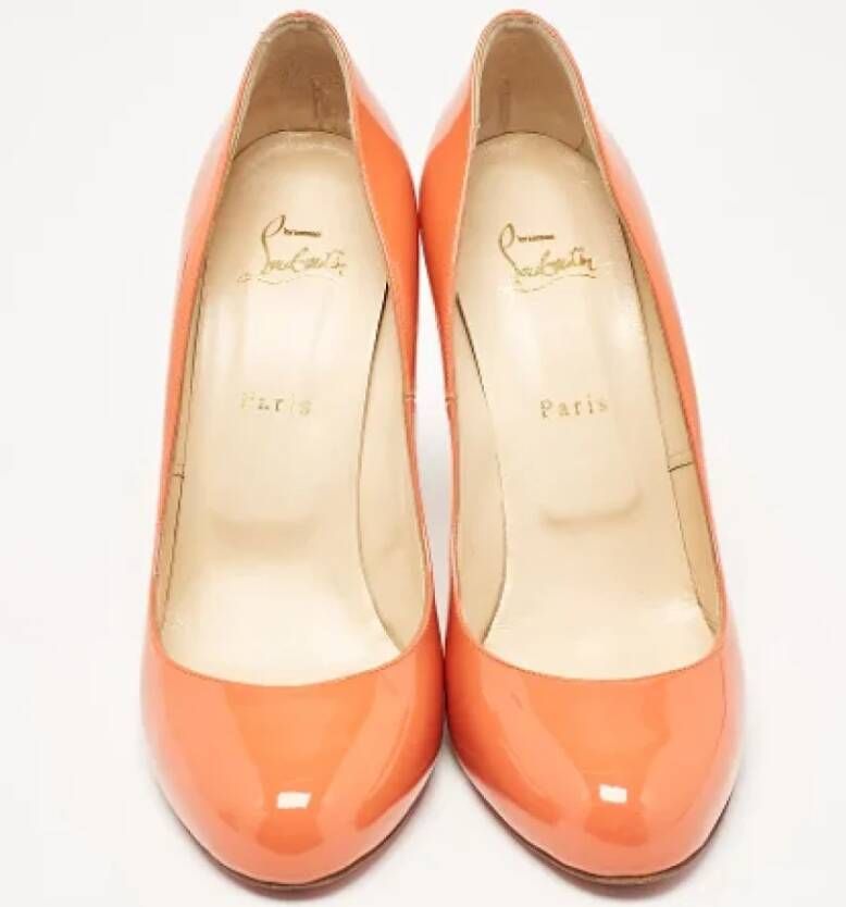 Christian Louboutin Pre-owned Canvas heels Orange Dames