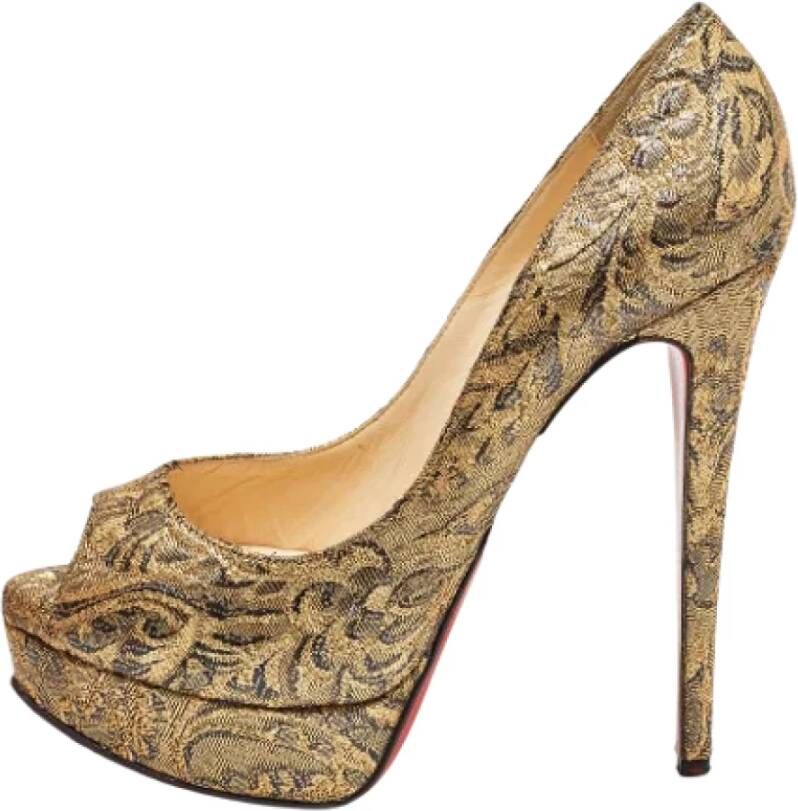 Christian Louboutin Pre-owned Fabric heels Yellow Dames