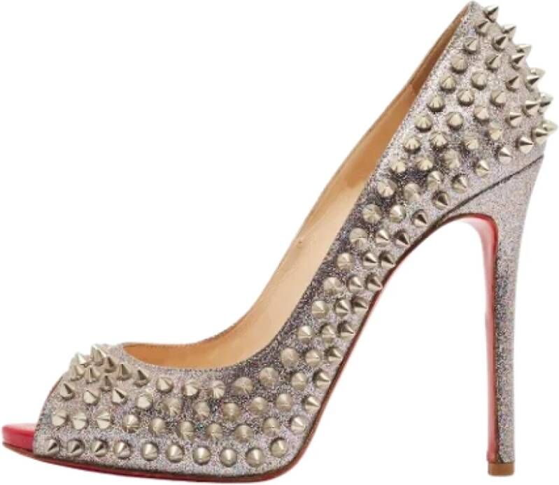 Christian Louboutin Pre-owned Fabric heels Yellow Dames