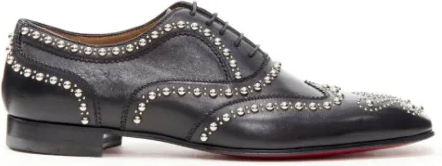 Christian Louboutin Pre-owned Leather flats Black Dames