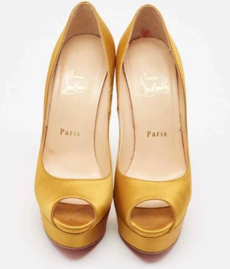 Christian Louboutin Pre-owned Satin heels Yellow Dames