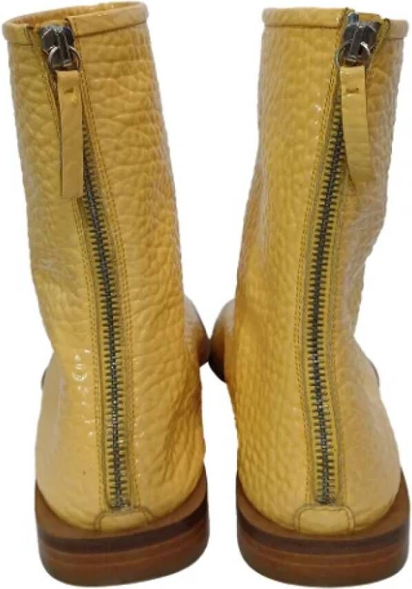 Acne Studios Pre-owned Leather boots Yellow Dames