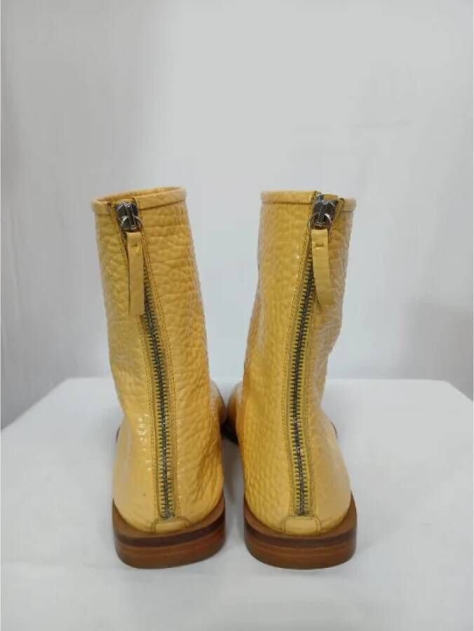 Acne Studios Pre-owned Leather boots Yellow Dames