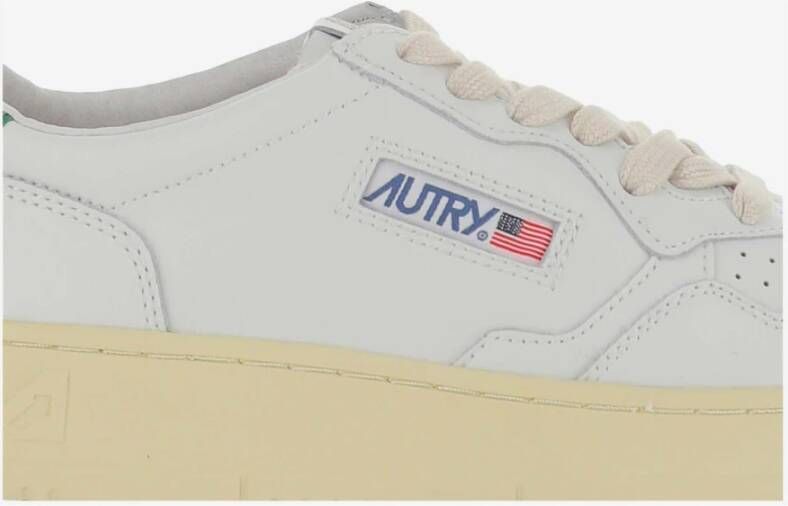 Autry Leren sneakers met logo details Beige Dames