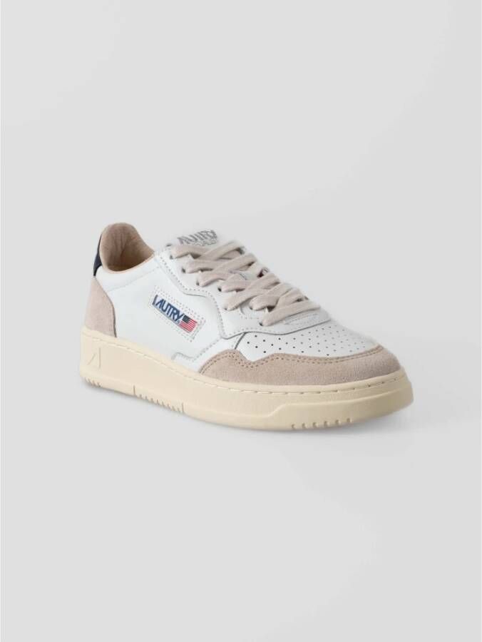 Autry Witte leren sneakers met blauwe hiel White Dames