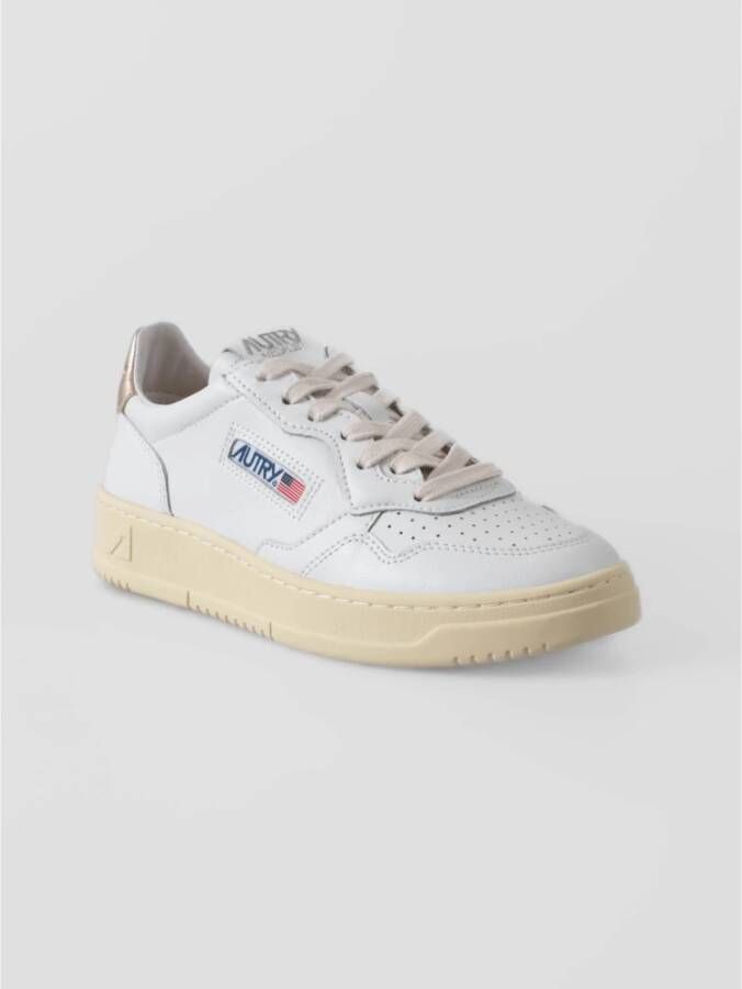 Autry Witte leren sneakers met gouden detail White Dames