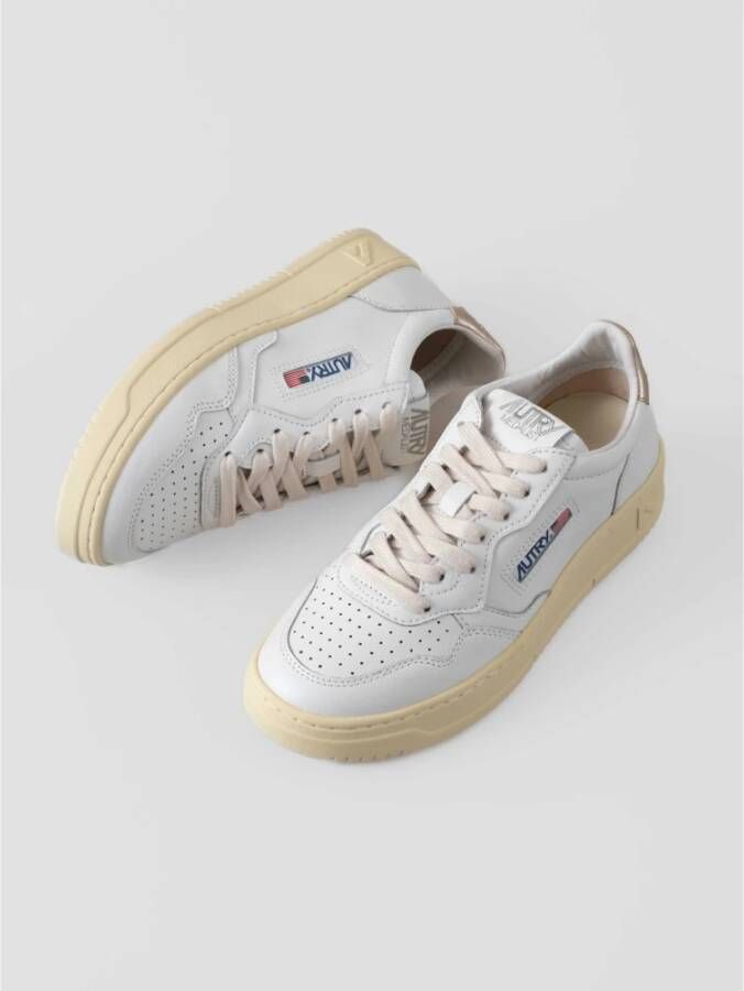 Autry Witte leren sneakers met gouden detail White Dames