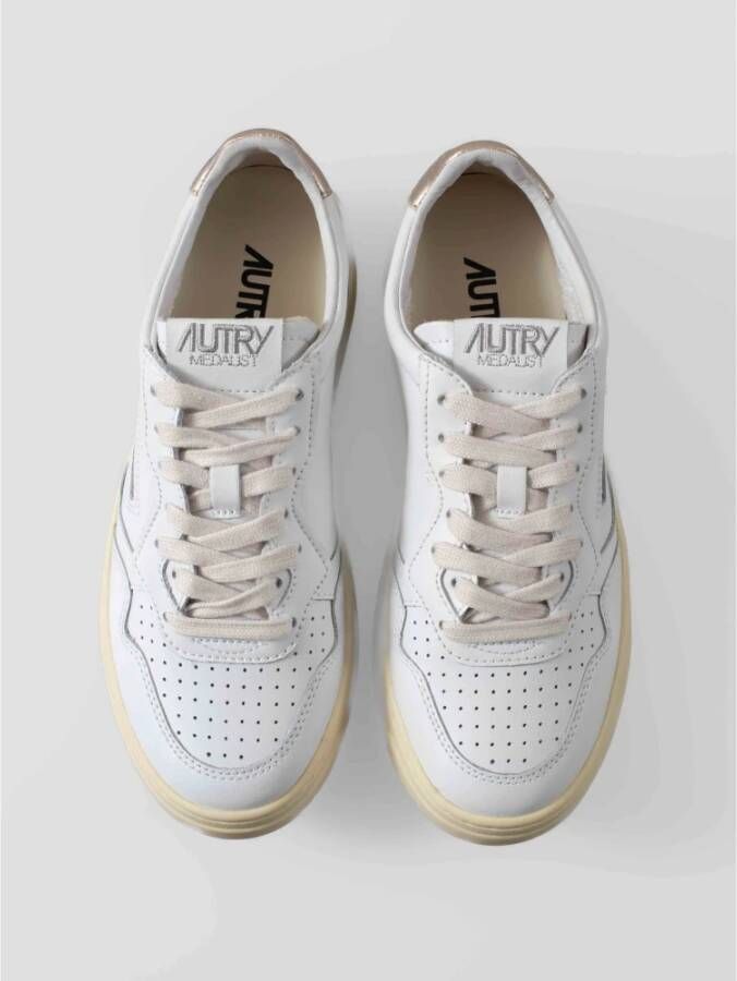 Autry Witte leren sneakers met gouden detail White Dames