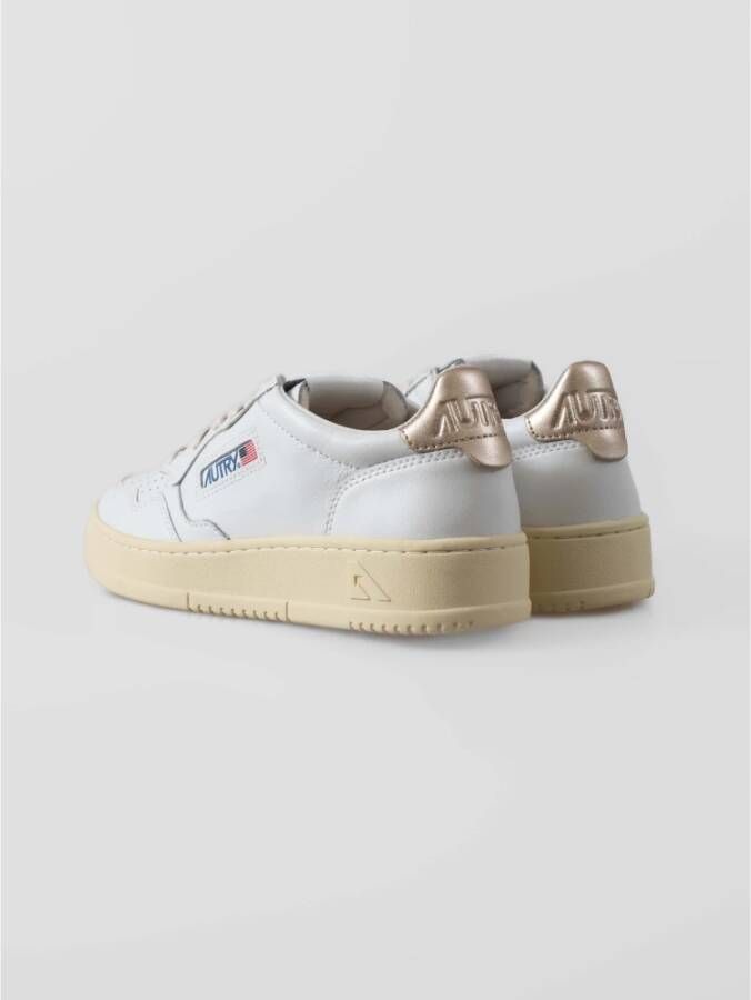 Autry Witte leren sneakers met gouden detail White Dames