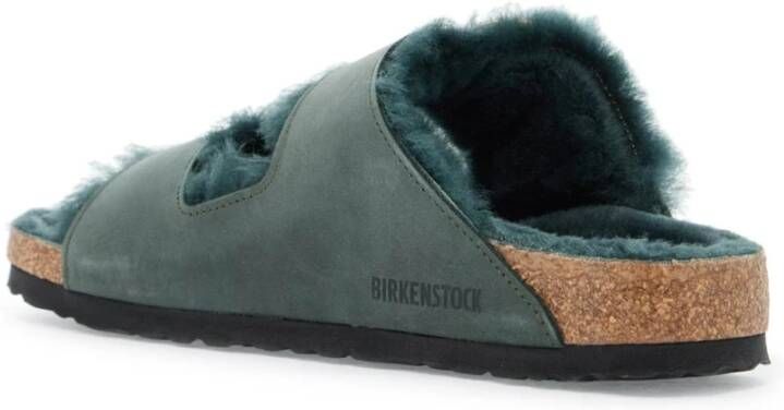 Birkenstock Slides van schapenvacht met verstelbare banden Green Dames