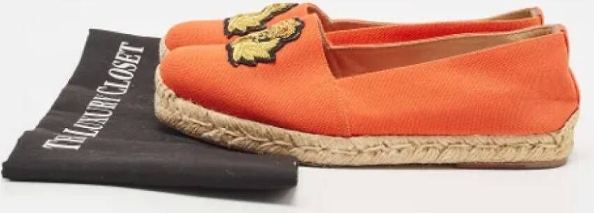 Christian Louboutin Pre-owned Canvas flats Orange Dames