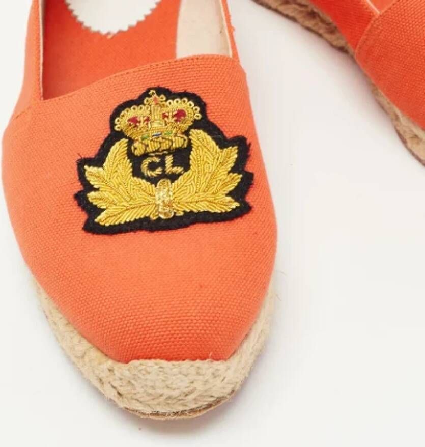 Christian Louboutin Pre-owned Canvas flats Orange Dames