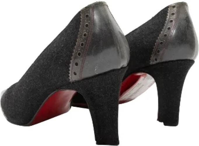 Christian Louboutin Pre-owned Canvas heels Black Dames