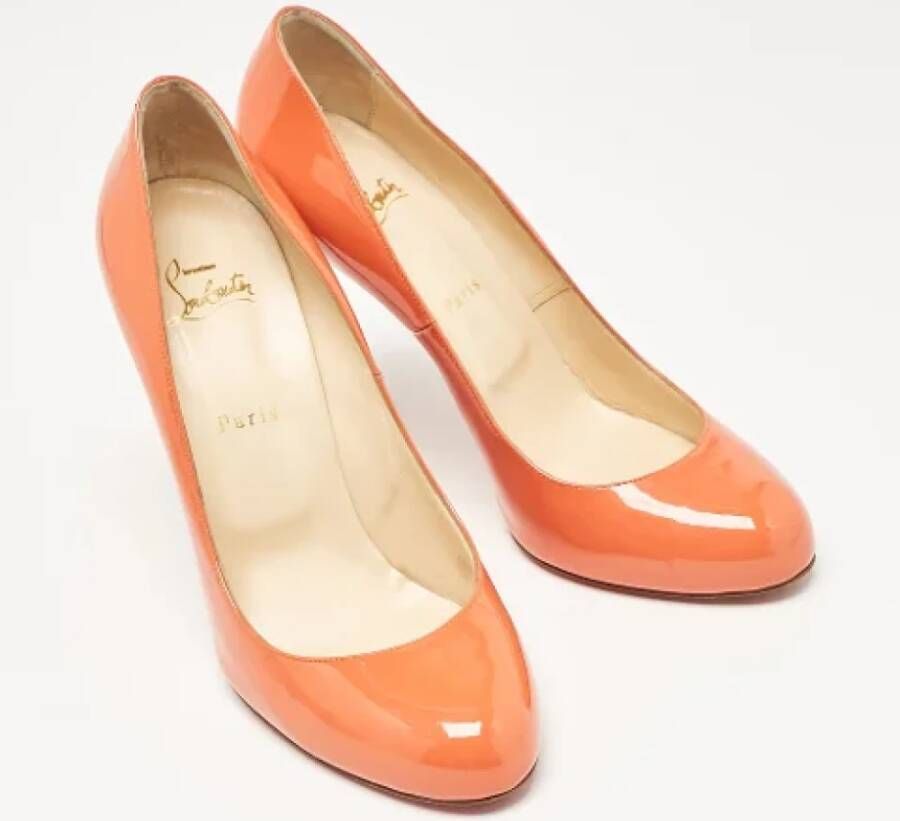 Christian Louboutin Pre-owned Canvas heels Orange Dames