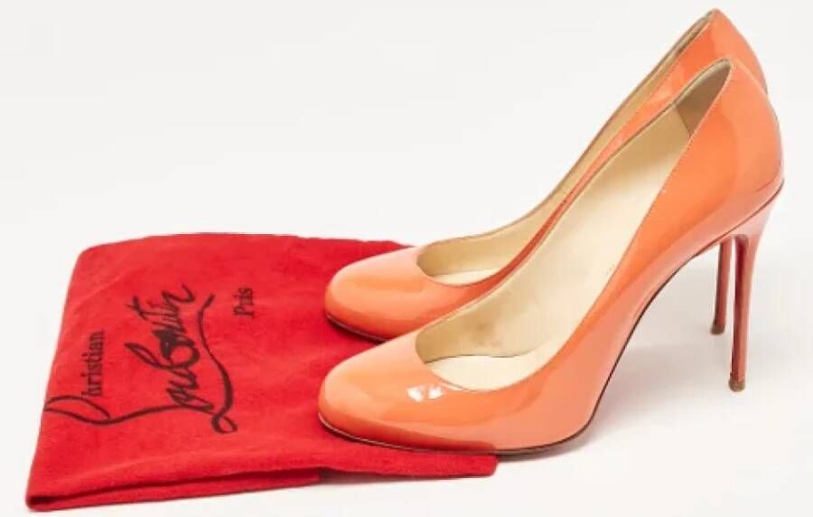 Christian Louboutin Pre-owned Canvas heels Orange Dames