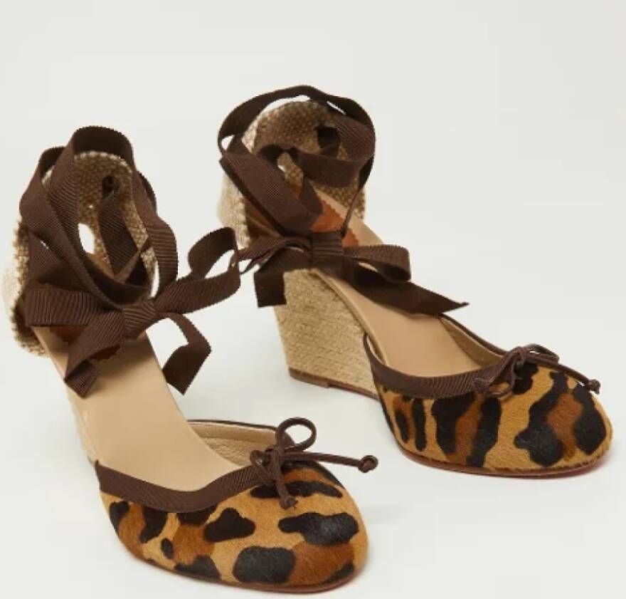 Christian Louboutin Pre-owned Canvas sandals Brown Dames