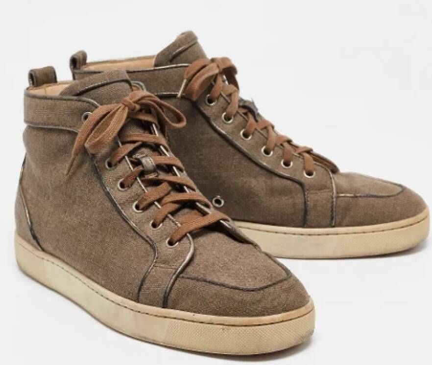 Christian Louboutin Pre-owned Canvas sneakers Brown Heren