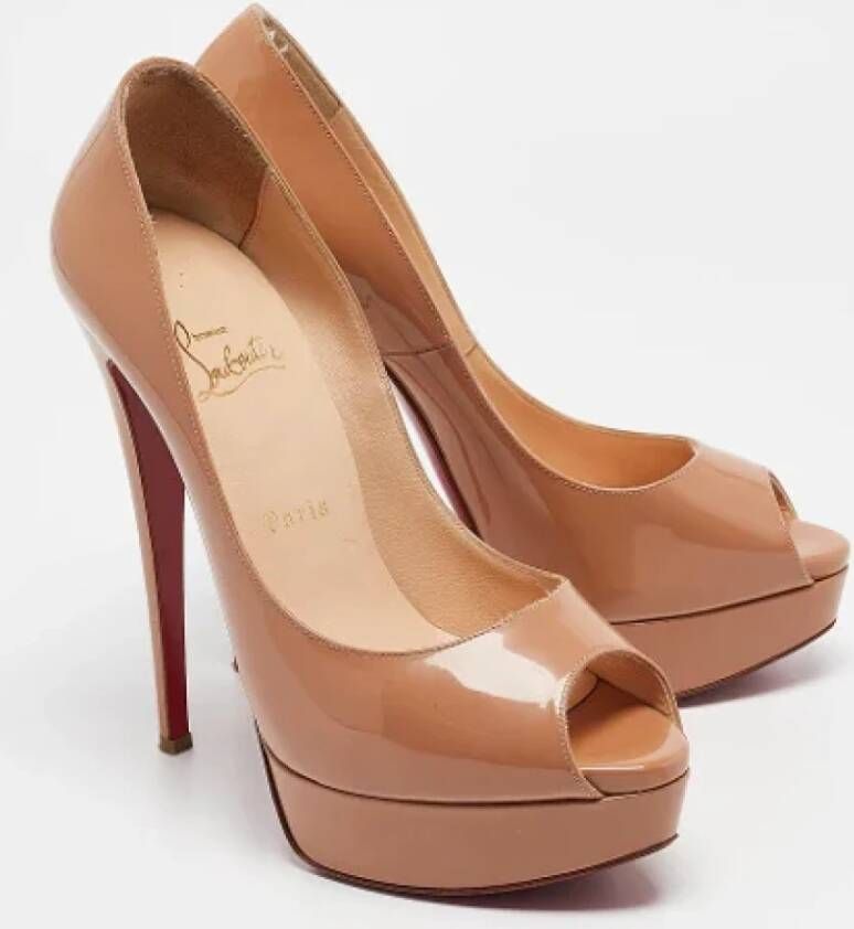 Christian Louboutin Pre-owned Fabric heels Beige Dames