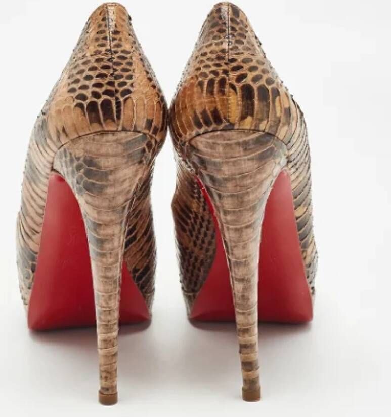 Christian Louboutin Pre-owned Fabric heels Brown Dames