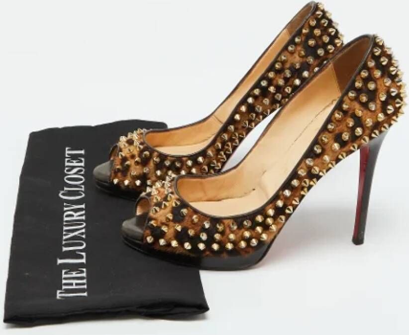 Christian Louboutin Pre-owned Fabric heels Brown Dames