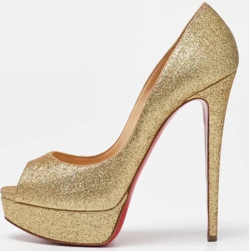 Christian Louboutin Pre-owned Fabric heels Yellow Dames