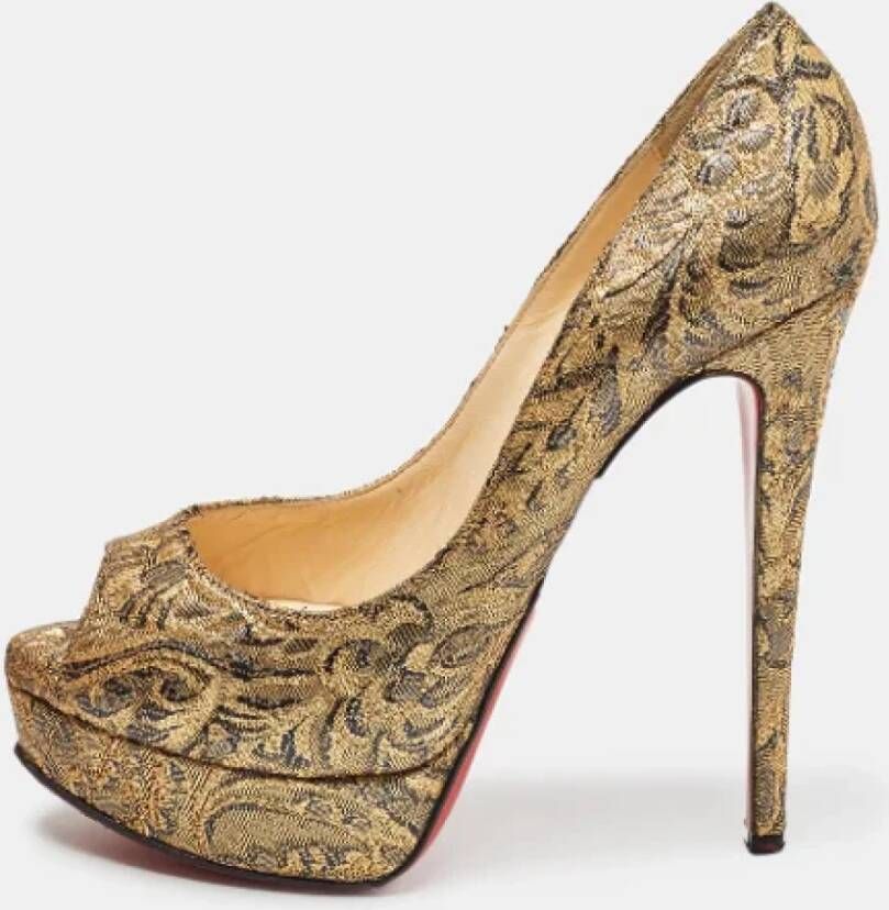 Christian Louboutin Pre-owned Fabric heels Yellow Dames