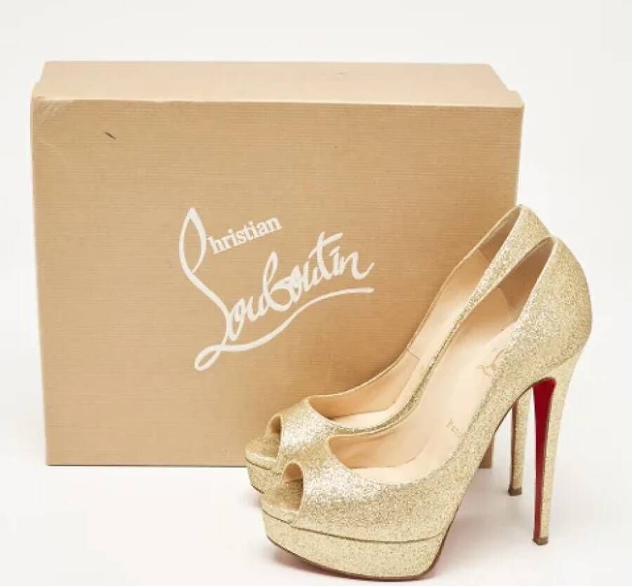 Christian Louboutin Pre-owned Fabric heels Yellow Dames