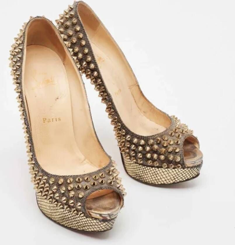 Christian Louboutin Pre-owned Fabric heels Yellow Dames