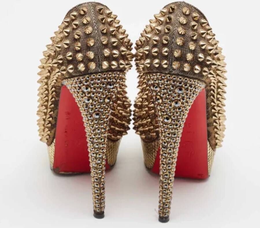 Christian Louboutin Pre-owned Fabric heels Yellow Dames