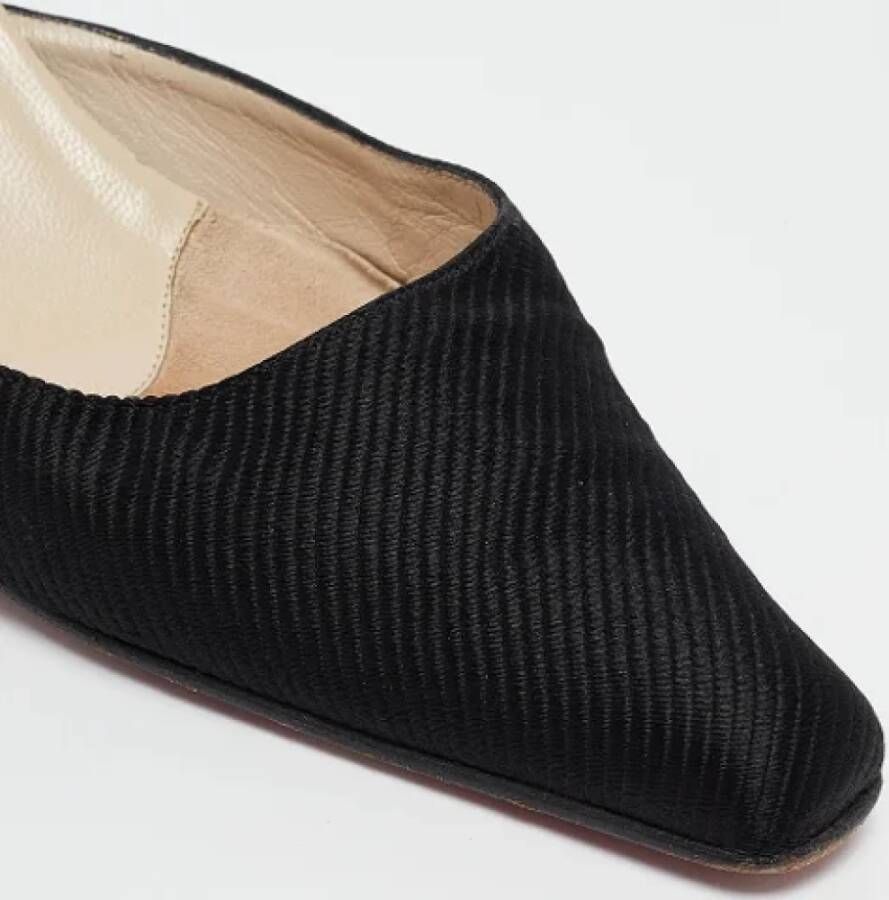 Christian Louboutin Pre-owned Fabric mules Black Dames