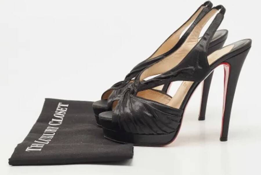 Christian Louboutin Pre-owned Fabric sandals Black Dames