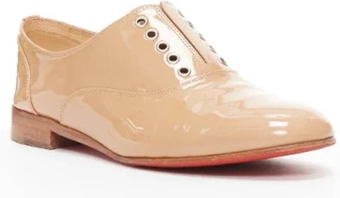 Christian Louboutin Pre-owned Leather flats Beige Dames