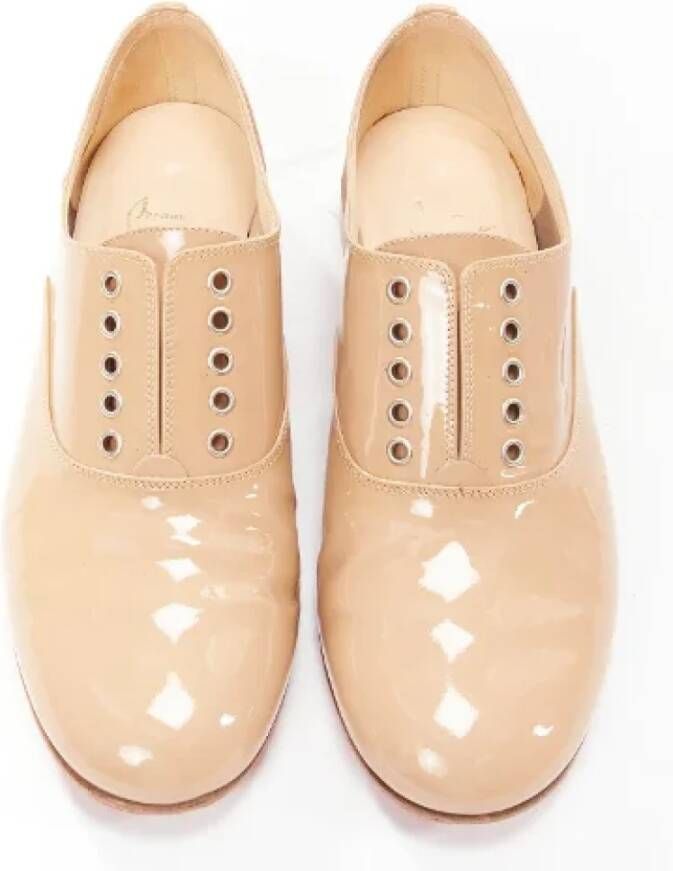 Christian Louboutin Pre-owned Leather flats Beige Dames