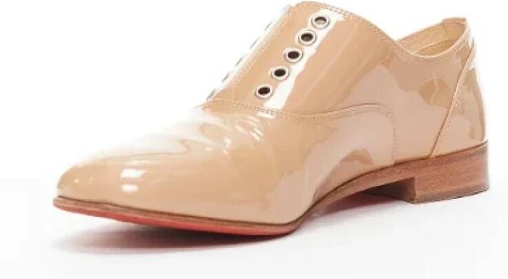 Christian Louboutin Pre-owned Leather flats Beige Dames